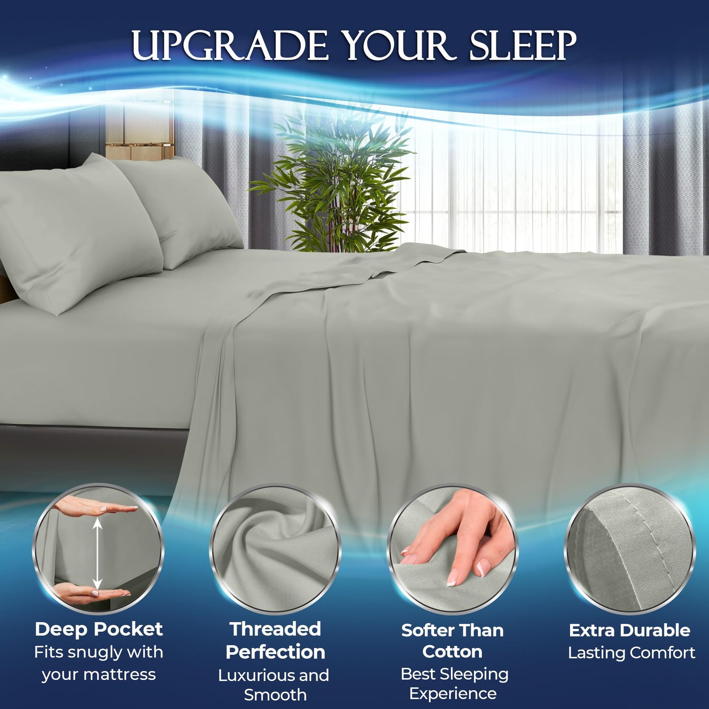 Light grey cooling sheet set on bed with fitted sheet, flat sheet, and pillowcases, smooth soft texture.