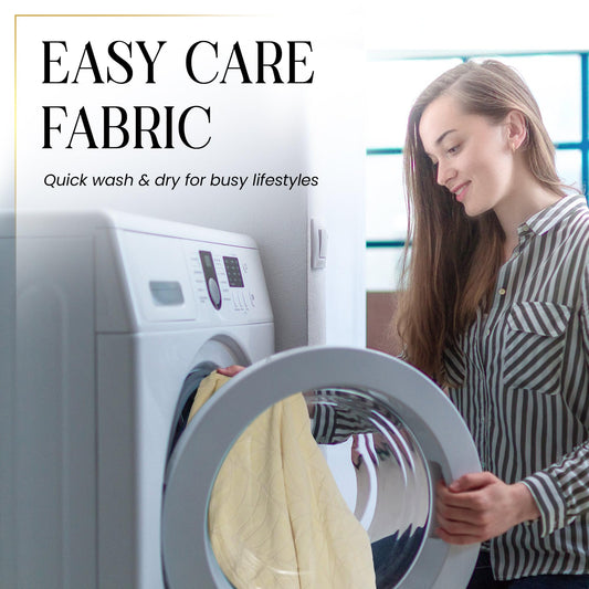 Woman loading waterproof dining chair cover into a washing machine demonstrating easy-care fabric feature