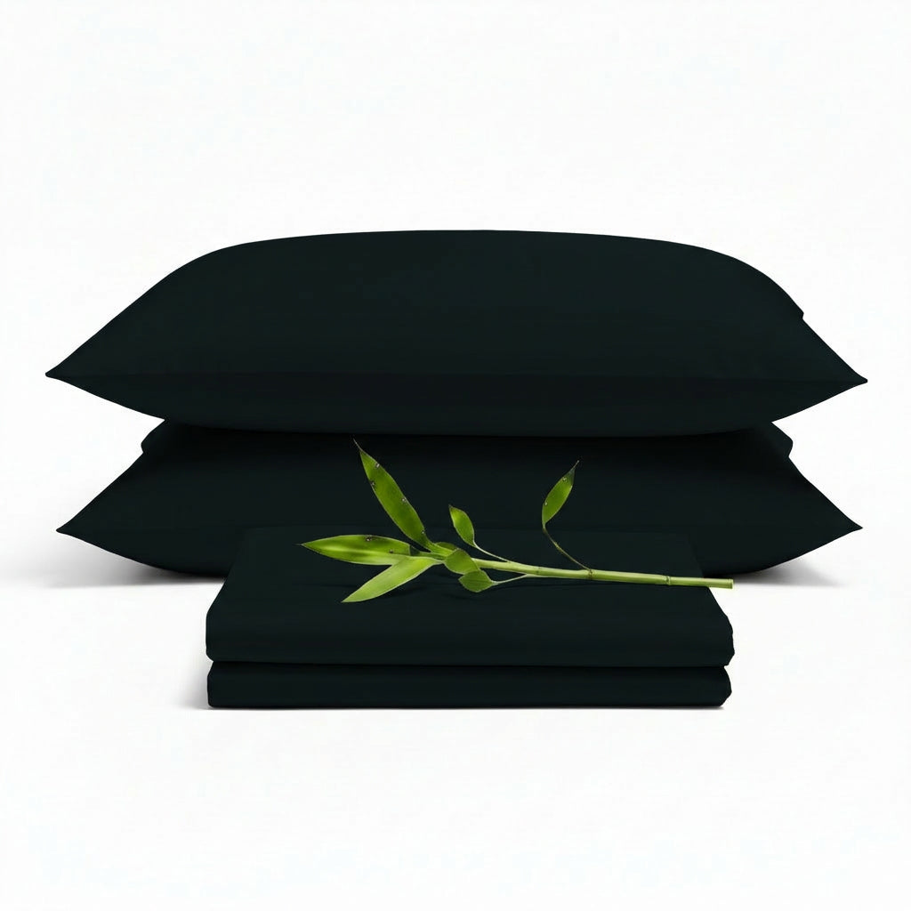 Decolure Black bamboo sheet set 4-piece set including fitted sheet, flat sheet, and two pillowcases, neatly arranged