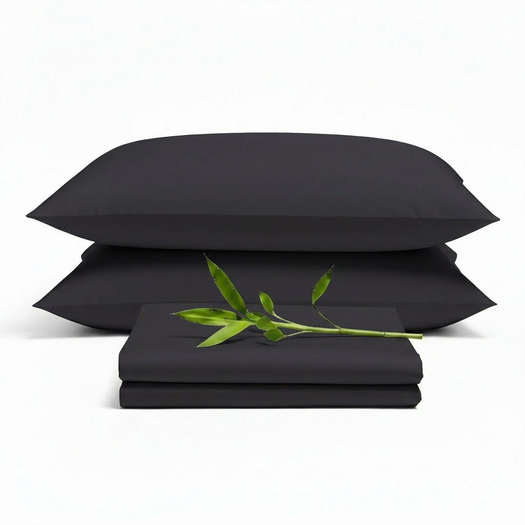 Decolure Charcoal bamboo sheet set 4-piece set including fitted sheet, flat sheet, and two pillowcases, neatly arranged