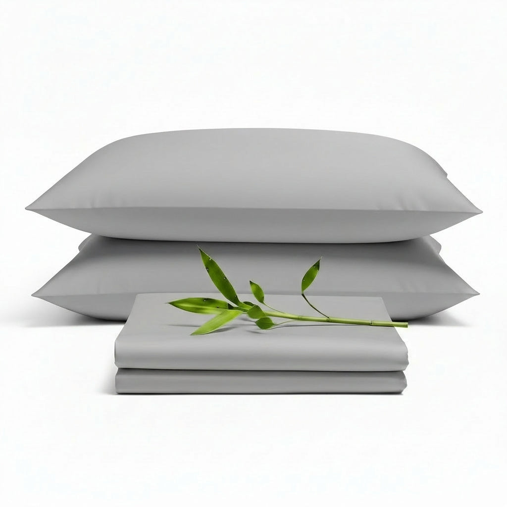 Decolure Light Grey bamboo sheet set 4-piece set including fitted sheet, flat sheet, and two pillowcases, neatly arranged