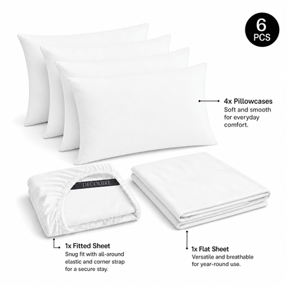 White Decolure sheet set shown as 6 pieces: 4 pillowcases, one folded fitted sheet and one folded flat sheet.