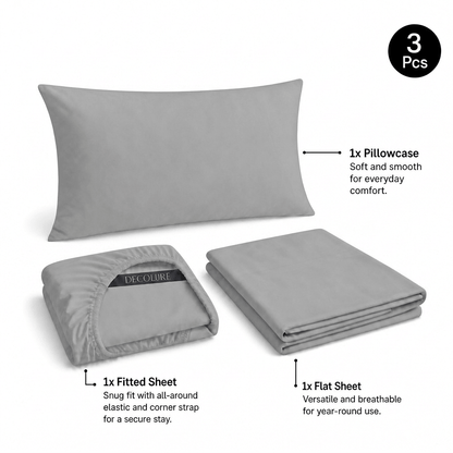 Light gray Decolure sheet set shown as 3 pieces: one pillowcase, one folded fitted sheet and one folded flat sheet.