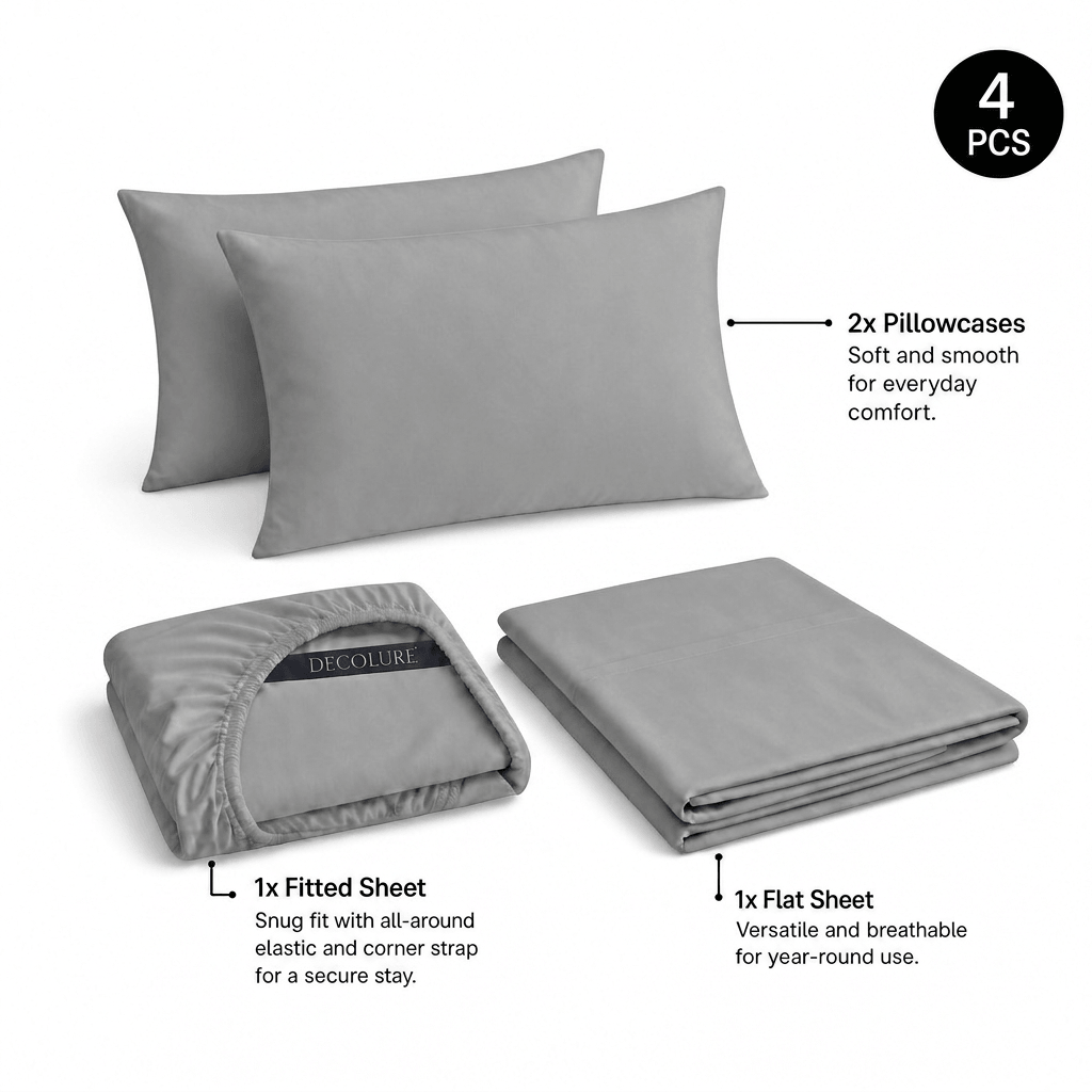 Light gray Decolure sheet set shown as 4 pieces: 2 pillowcases, one folded fitted sheet and one folded flat sheet.