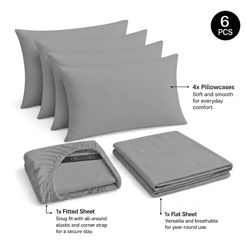Light gray Decolure sheet set shown as 6 pieces: 4 pillowcases, one folded fitted sheet and one folded flat sheet.
