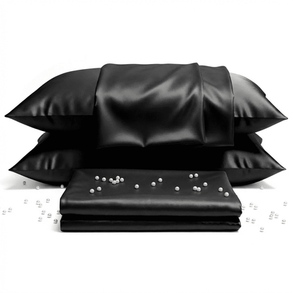 Black satin pillowcases with pearls on a white background