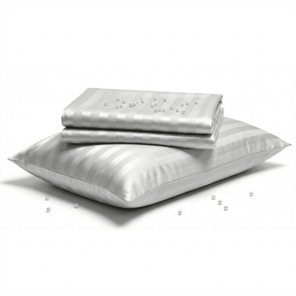 Silver striped bed sheet set with two pillows on a white background