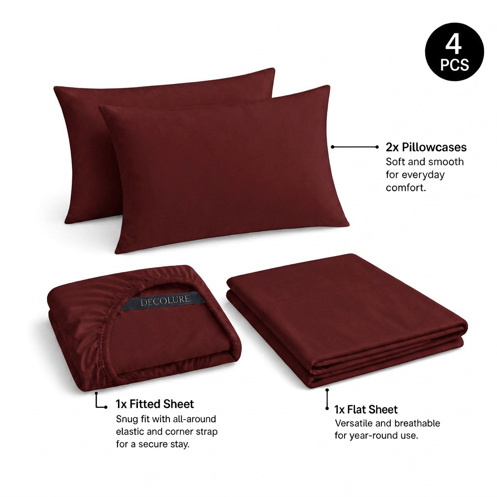 Burgundy Decolure sheet set shown as 4 pieces: 2 pillowcases, one folded fitted sheet and one folded flat sheet.