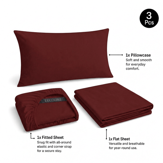 Burgundy Decolure sheet set shown as 3 pieces: one pillowcase, one folded fitted sheet and one folded flat sheet.