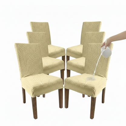Set of six beige chairs with a hand holding a spray bottle on a white background