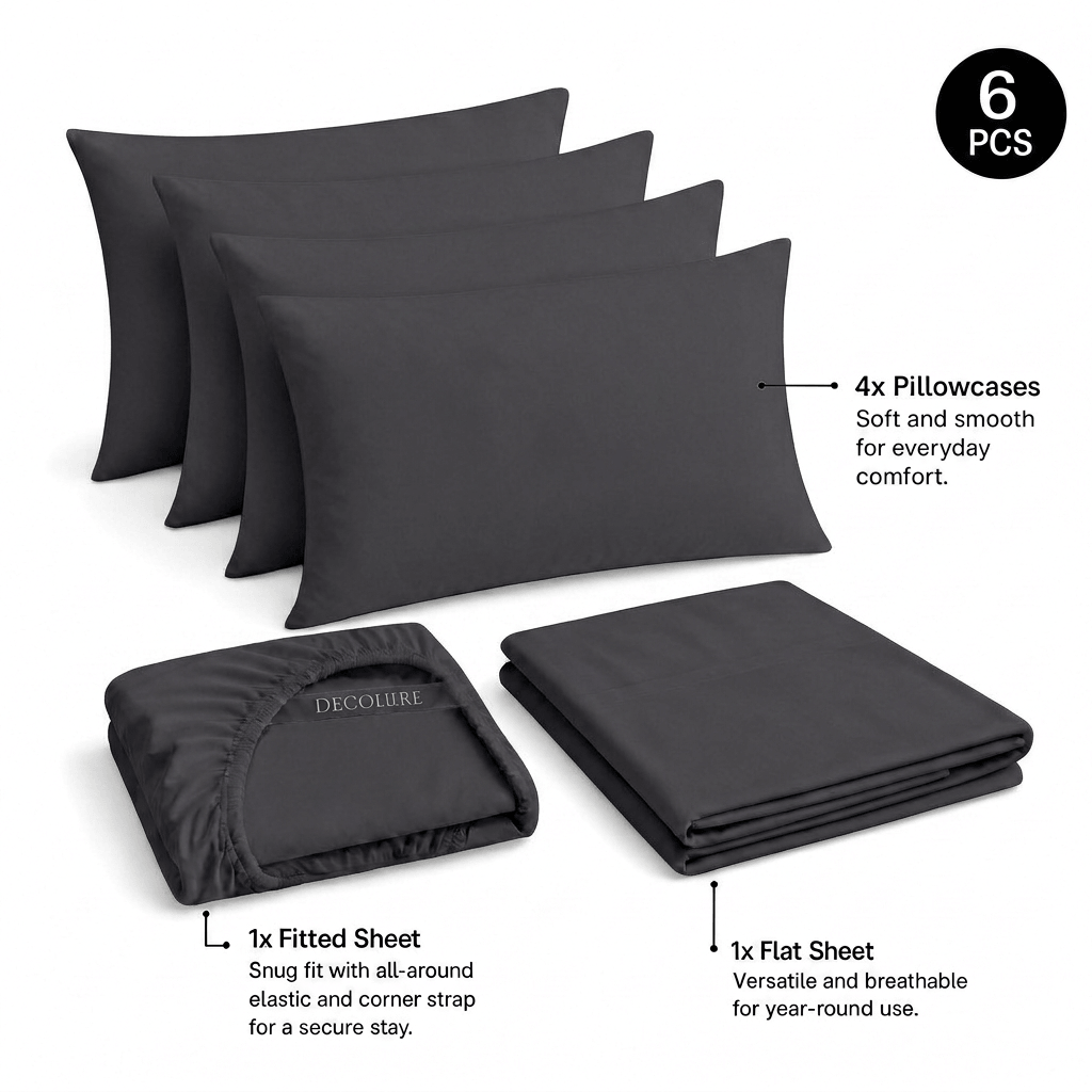 Charcoal gray Decolure sheet set shown as 6 pieces: 4 pillowcases, one folded fitted sheet and one folded flat sheet.