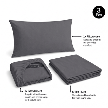 Gray Decolure sheet set shown as 3 pieces: one pillowcase, one folded fitted sheet and one folded flat sheet.