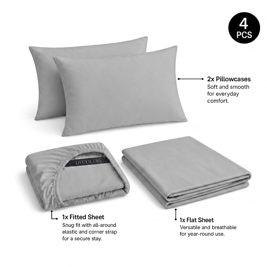 Light gray Decolure sheet set shown as 4 pieces: 2 pillowcases, one folded fitted sheet and one folded flat sheet.