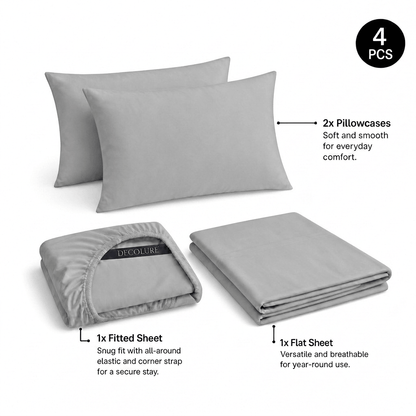 Light gray Decolure sheet set shown as 4 pieces: 2 pillowcases, one folded fitted sheet and one folded flat sheet.