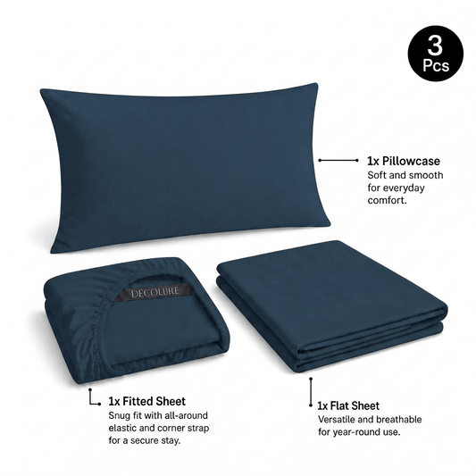 Navy blue Decolure sheet set shown as 3 pieces: one pillowcase, one folded fitted sheet and one folded flat sheet.