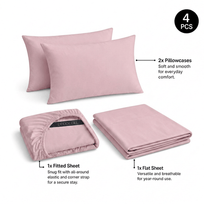 Blush pink Decolure sheet set shown as 4 pieces: 2 pillowcases, one folded fitted sheet and one folded flat sheet.